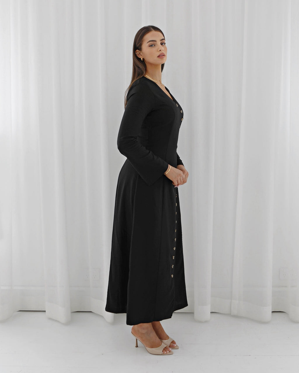 long black button dress Black long-sleeve dress with refined button details